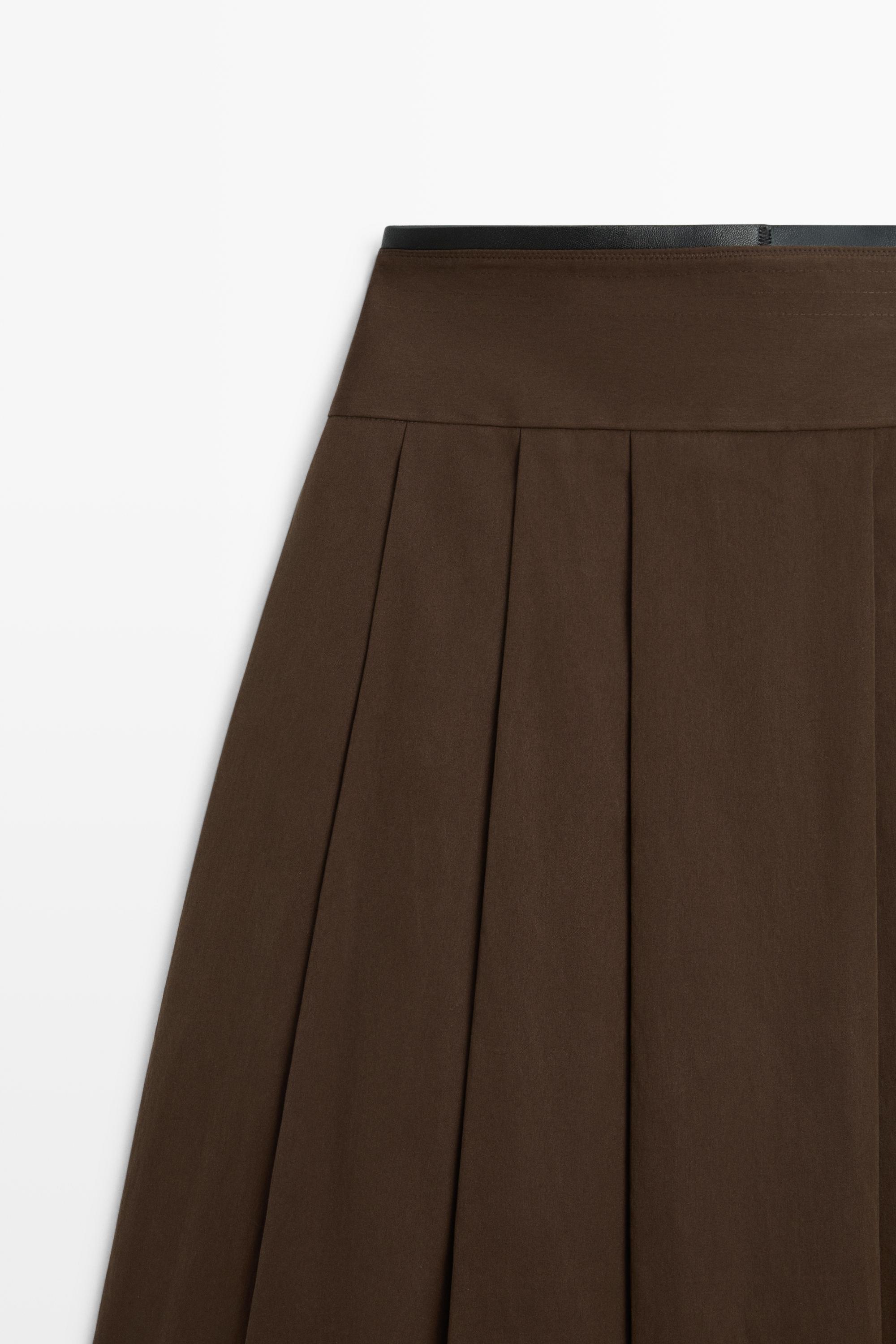 Jupe midi plissée détail cuir